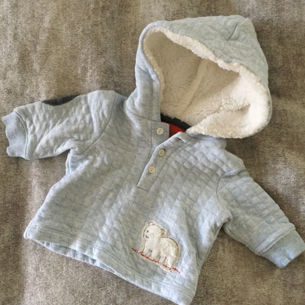 Quilted sweater with hood